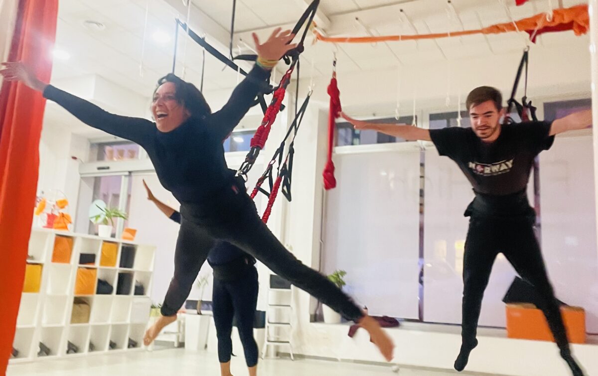 Persons jumping with bungee fitness